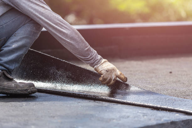 Professional Waterproofing technician working in Windsor, NC